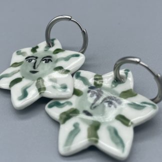 Pendientes estrella verde carita