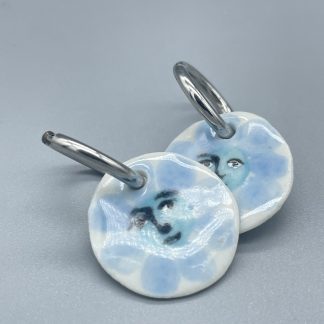 Pendientes florecillas azul cara